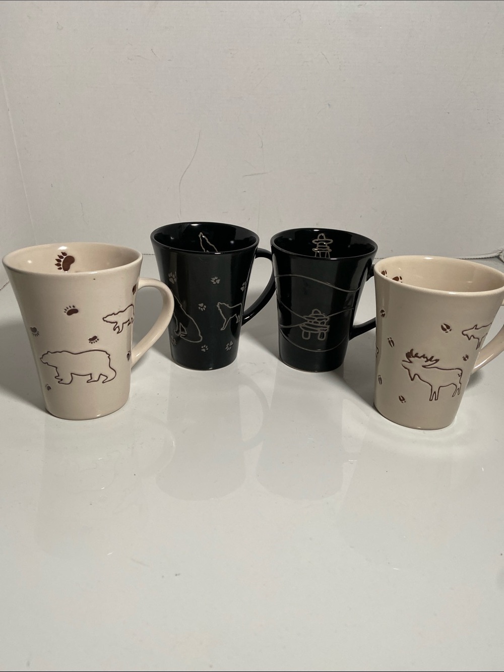 Set of 4 Oscardo Mugs-incised Designs Wolf, Bear, Moose and Inuksuk